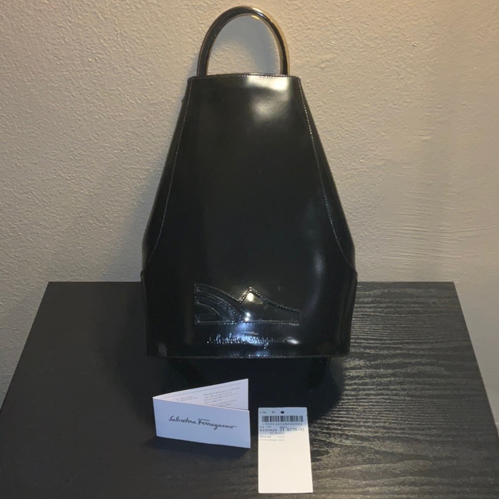 Salvatore Ferragamo vintage black leather backpack with removable inner pouch